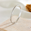 Justine I Bracelet jonc en acier inoxydable et zircons